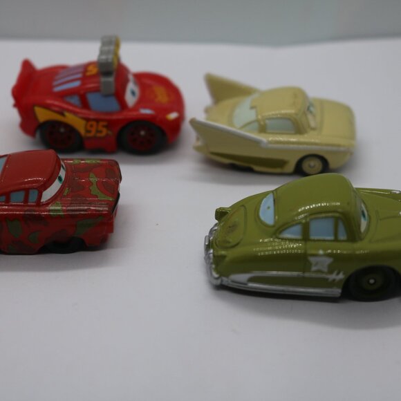 Disney Pixar lot of 4 I think these are Mini's - Picture 1 of 6
